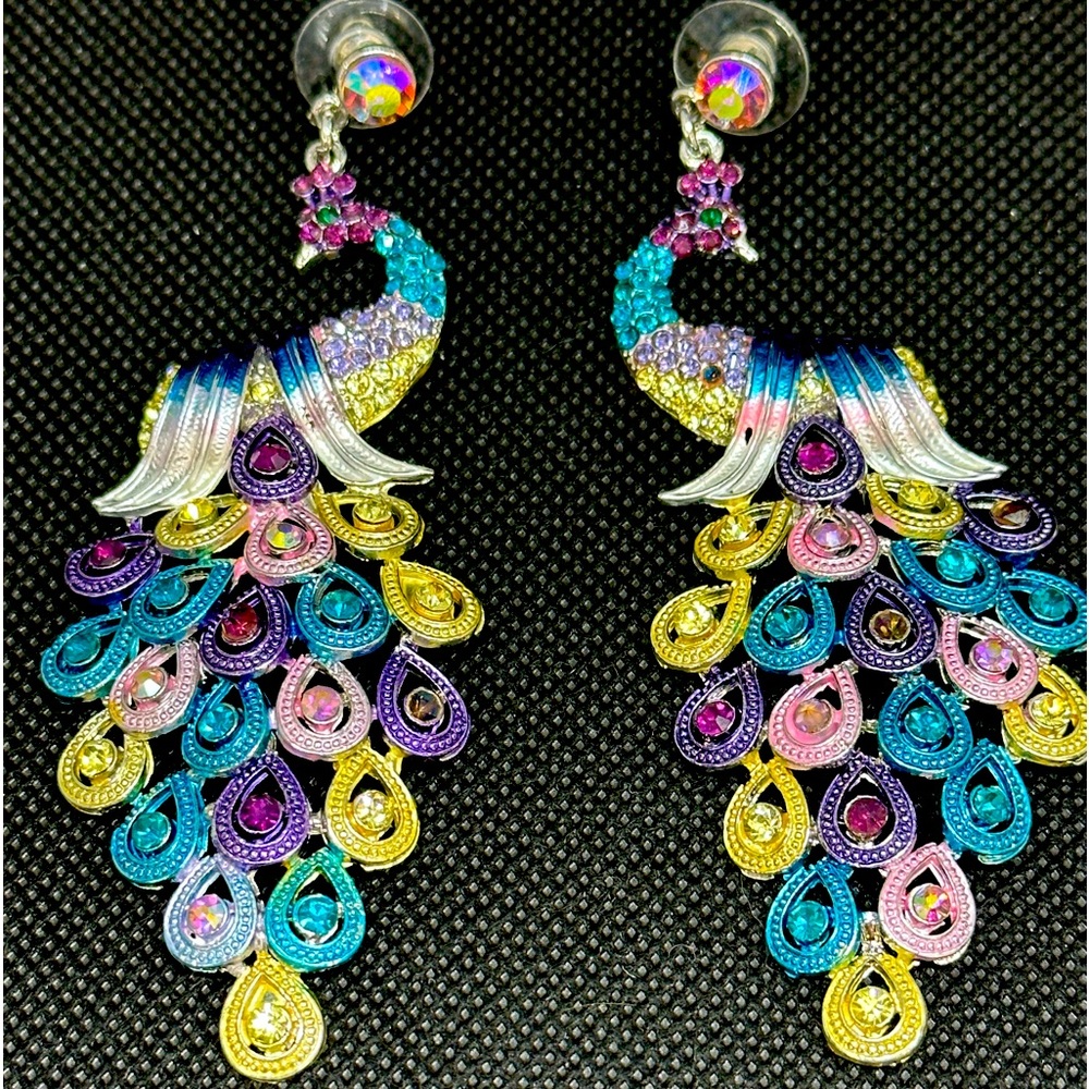 Large peacock crystal earrings.